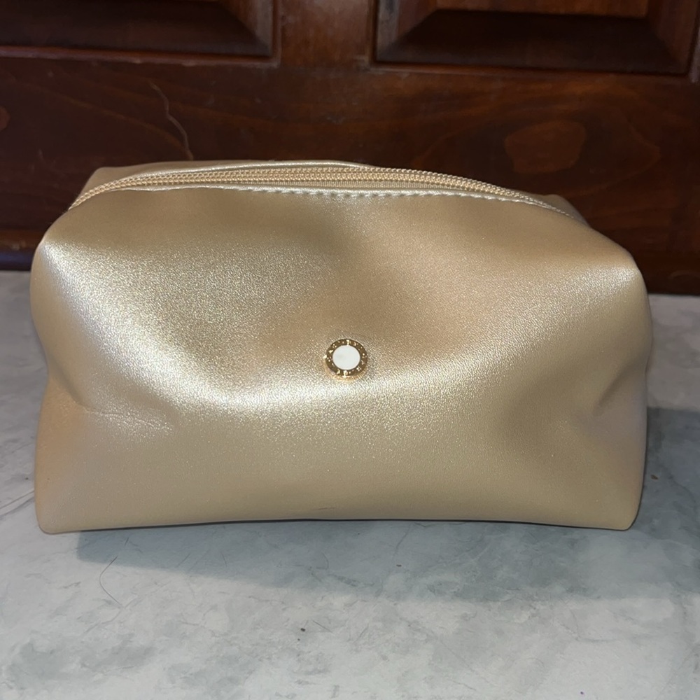 Bvlgari   Cosmetic pouch conjunction/ UAE Airlines  zippered metallic gold
NWOT